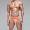 ADANNU Bad Kid Start Briefs men's moisture wicking briefs in orange, front view