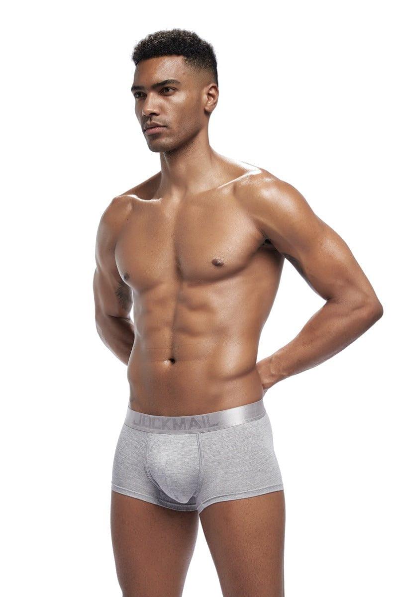 Daily wear|Gym sessions|Holiday parties|Pride events|Night gatherings|Breathable|Butt-lift design|Snug fit|Lightweight|Shaping|Waistline control|Slimming|Abdomen control|Comfort|Proper support|Stylish appearance|Festive mood|Body sculpting|Men's trunks|Low-rise underwear|Polyester pouch trunks|Core design trunks|Sexy trunks|Gray|Front view2