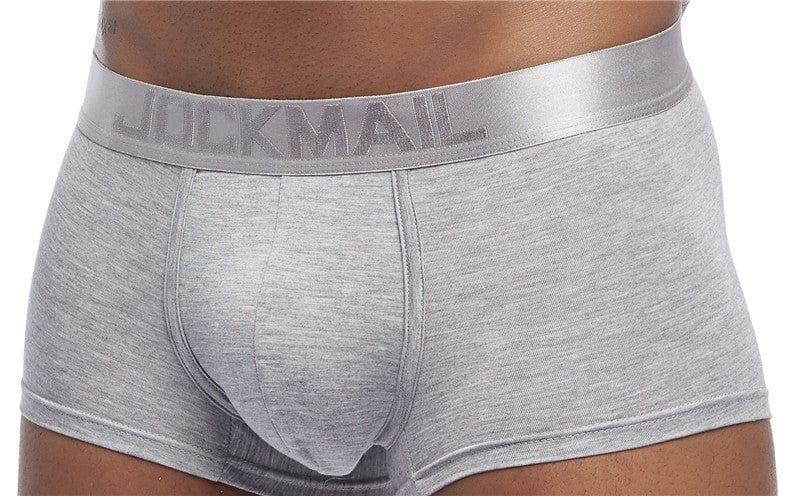 Daily wear|Gym sessions|Holiday parties|Pride events|Night gatherings|Breathable|Butt-lift design|Snug fit|Lightweight|Shaping|Waistline control|Slimming|Abdomen control|Comfort|Proper support|Stylish appearance|Festive mood|Body sculpting|Men's trunks|Low-rise underwear|Polyester pouch trunks|Core design trunks|Sexy trunks|Gray|Front view3