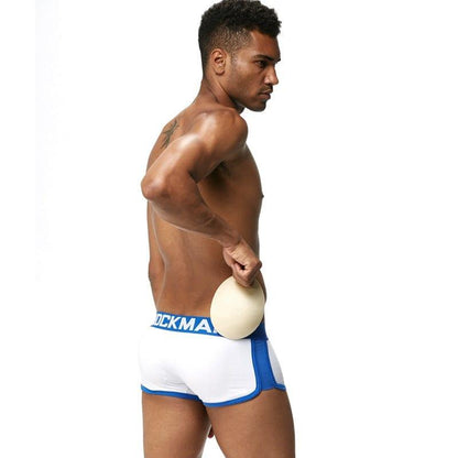 Daily wear|Gym sessions|Holiday parties|Pride events|Night gatherings|Breathable|Butt-lift design|Snug fit|Lightweight|Shaping|Waistline control|Slimming|Abdomen control|Comfort|Proper support|Stylish appearance|Festive mood|Body sculpting|Men's trunks|Low-rise underwear|Cotton trunks|Sponge pad trunks|Sexy trunks|White|Back view