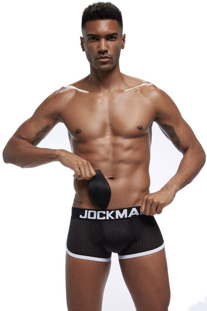 Daily wear|Gym sessions|Holiday parties|Pride events|Night gatherings|Breathable|Butt-lift design|Snug fit|Lightweight|Shaping|Waistline control|Slimming|Abdomen control|Comfort|Proper support|Stylish appearance|Festive mood|Body sculpting|Men's trunks|Low-rise underwear|Mesh trunks|Sponge pad trunks|Sexy trunks|Black|Front view