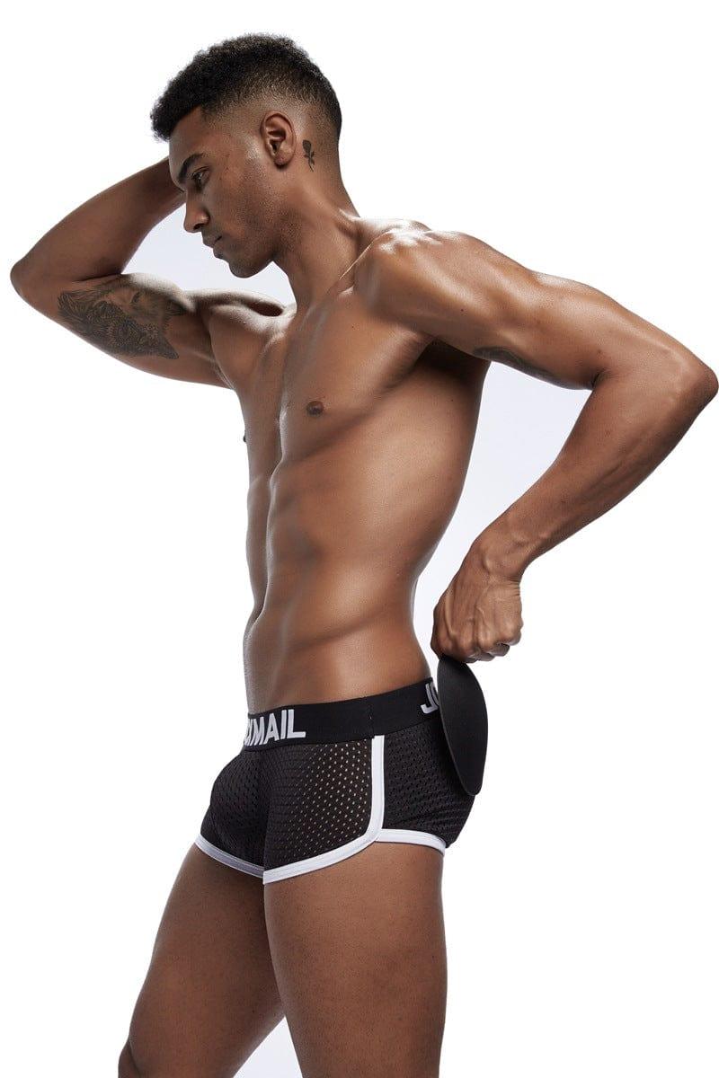 Daily wear|Gym sessions|Holiday parties|Pride events|Night gatherings|Breathable|Butt-lift design|Snug fit|Lightweight|Shaping|Waistline control|Slimming|Abdomen control|Comfort|Proper support|Stylish appearance|Festive mood|Body sculpting|Men's trunks|Low-rise underwear|Mesh trunks|Sponge pad trunks|Sexy trunks|Black|Left Side view