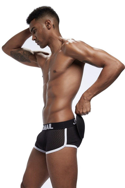 Daily wear|Gym sessions|Holiday parties|Pride events|Night gatherings|Breathable|Butt-lift design|Snug fit|Lightweight|Shaping|Waistline control|Slimming|Abdomen control|Comfort|Proper support|Stylish appearance|Festive mood|Body sculpting|Men's trunks|Low-rise underwear|Mesh trunks|Sponge pad trunks|Sexy trunks|Black|Left Side view