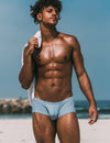 Gym workout|Sports training|Running sessions|Fitness routines|Athletic fit|Breathable|Supportive waistband|Moisture control|Muscle support|Freedom of movement|Daily activity|Men's trunks|Sport underwear|Low-rise trunks|TAUWELL trunks|Blue|Front view